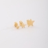 TBF-00018 TRIO DE BRINCOS BANHADOS A OURO 18K EM FORMATO DE ESTRELA