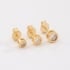 TBF-0043 TRIO DE BRINCOS BANHADOS A OURO 18K COM PEDRAS REDONDAS