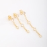 TBR-00020 TRIO DE BRINCOS COM DETALHES PENDURADOS EM ZIRCÔNIAS