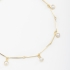 TN-00111 TORNOZELEIRA BANHADA A OURO 18K COM DETALHES EM PÉROLAS