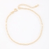 TN-00132 TORNOZELEIRA BANHADA A OURO 18K COM DETALHES EM ESFERAS