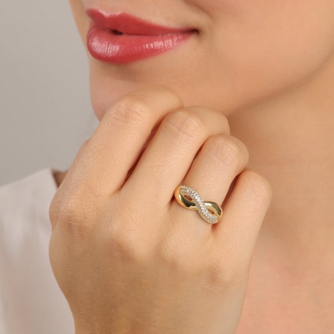 AN-01959 ANEL BANHADO A OURO 18K COM DESIGN INFINITO EM ZIRCÔNIAS