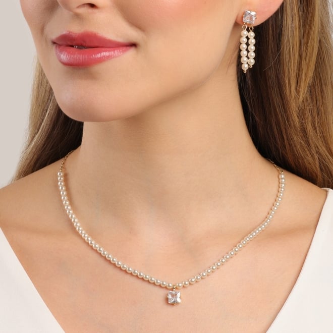 BR-00412 BRINCO BANHADO A OURO 18K COM PEDRA EM ZIRCÔNIA E DETALHES EM PÉROLAS