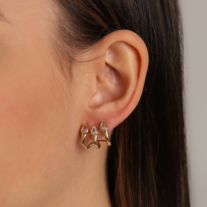 BR-02783-BRINCO BANHADO A OURO 18K COM DESIGN ORGÂNICO GOTA