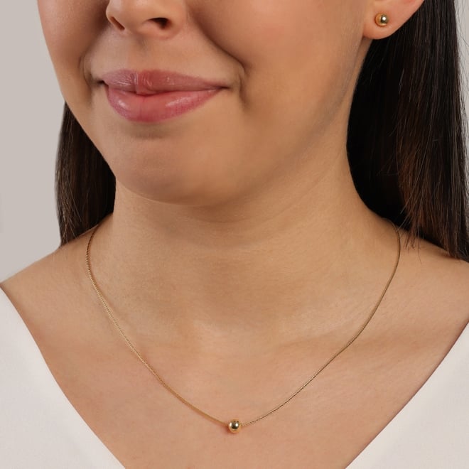 CJS-00134 CONJUNTO BANHADO A OURO 18K EM BOLA LISA.