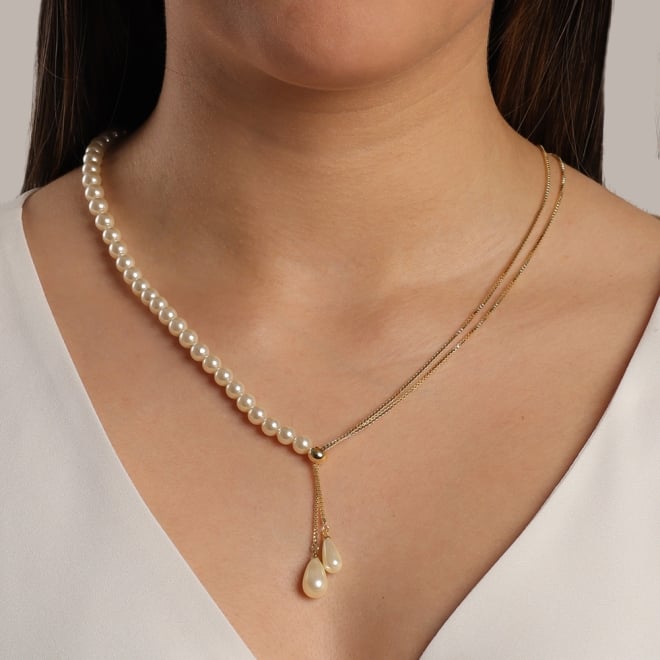 GR-01257 COLAR BANHADO A OURO 18K MODELO GRAVATINHA COM DETALHES EM PÉROLAS.