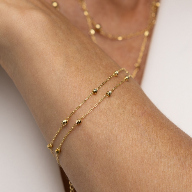 PU-00534-PULSEIRA BANHADA A OURO 18K COM ESFERAS TRABALHADAS