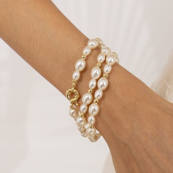 PU-00961 PULSEIRA BANHADA A OURO 18K COM P&Eacute;ROLAS EM FORMATO OVAL E ESFERAS POLIDAS