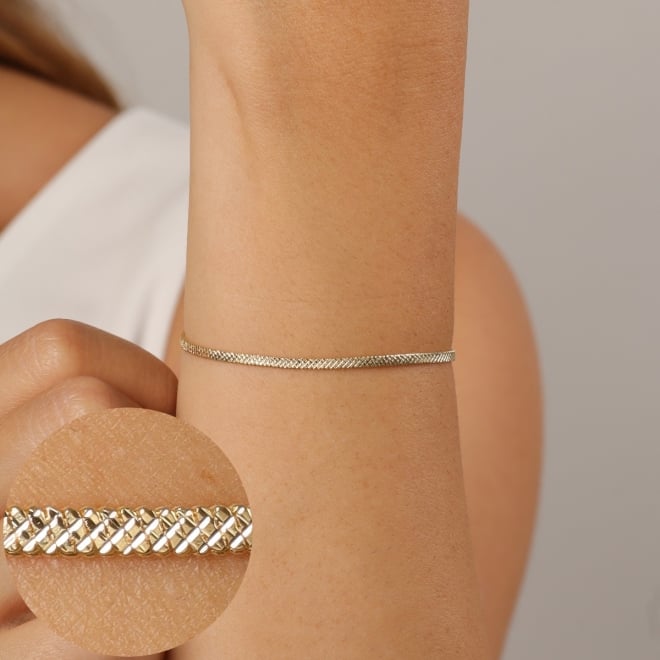 PR-0161 PULSEIRA BANHADA A OURO 18K COM CORRENTE TIPO FITA TRABALHADA NA MALHA