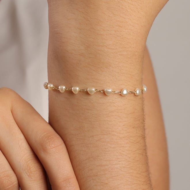 PU-00011 PULSEIRA BANHADA A OURO 18K COM PÉROLAS EM FORMATO DE CORAÇÃO