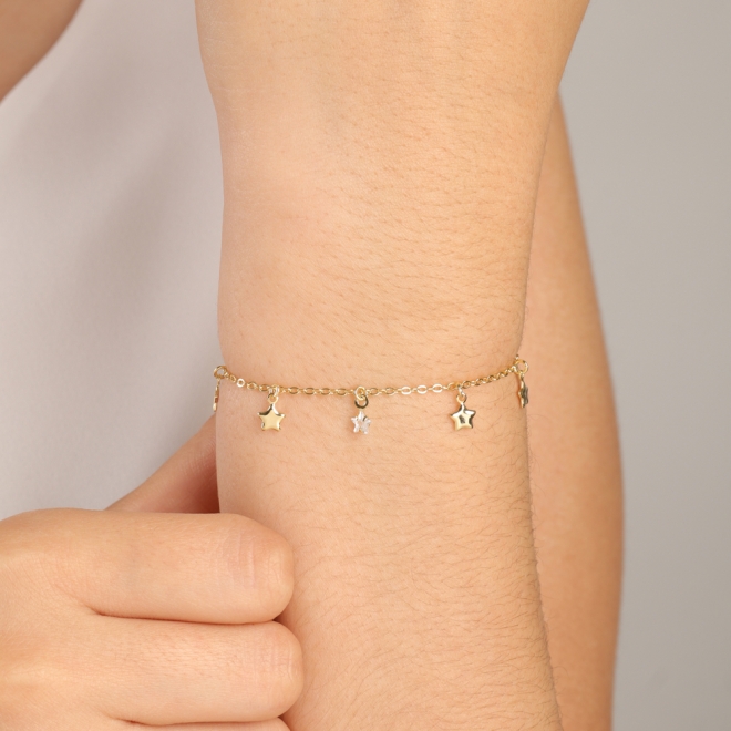 PU-00140 PULSEIRA BANHADA A OURO 18K COM PINGENTES EM FORMATO DE ESTRELAS