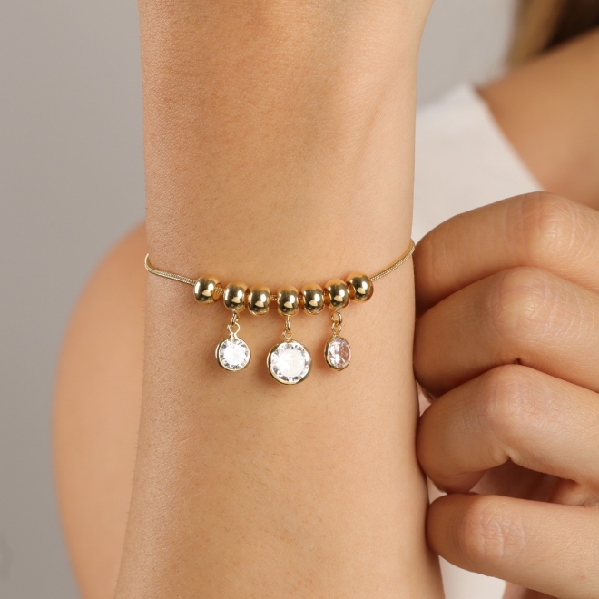PU-00450 PULSEIRA BANHADA A OURO 18K COM ESFERAS POLIDAS E PINGENTES EM ZIRCÔNIA CRISTAL