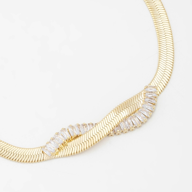 PU-00523 PULSEIRA COM DESIGN TORCIDO E DETALHES EM ZIRCÔNIAS