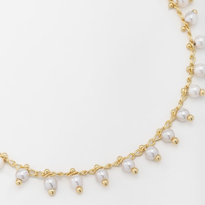 PU-00558 PULSEIRA COM DETALHES EM PÉROLAS PENDENTES