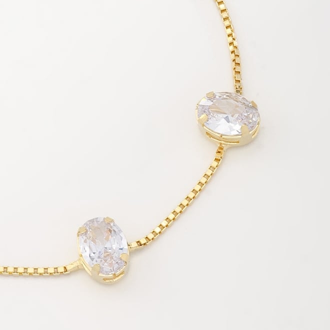 PU-00796 PULSEIRA COM TRÊS ZIRCÔNIAS LAPIDADAS EM FORMATO OVAL E FECHO AJUSTÁVEL