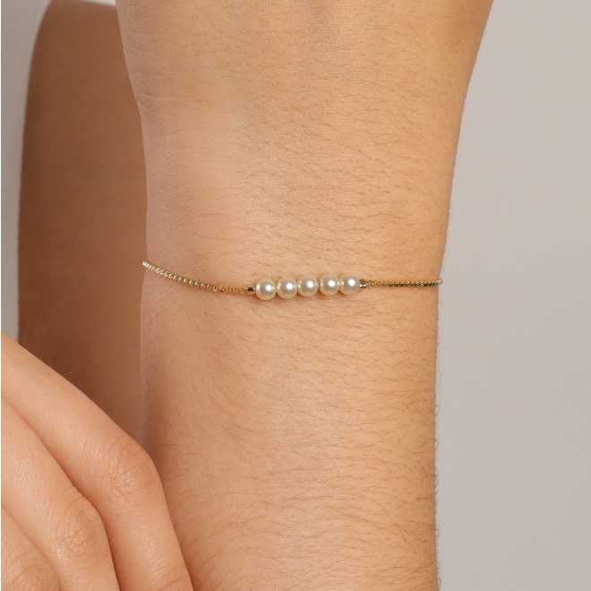 PU-00856 PULSEIRA AJUSTÁVEL COM DETALHES EM PÉROLAS