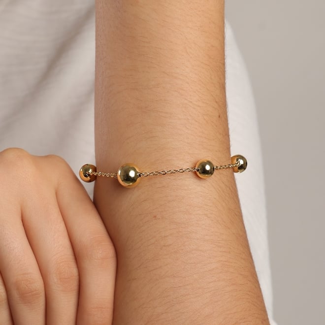 PU-00858 PULSEIRA COM BOLAS POLIDAS INTERCALADAS NA CORRENTE