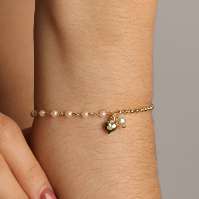 PU-00873 PULSEIRA COM PINGENTES DE PÉROLA E CORAÇÃO