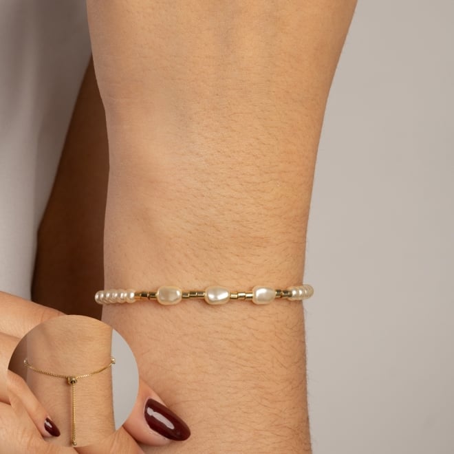 PU-00885 PULSEIRA BANHADA A OURO 18K REGUL&Aacute;VEL COM P&Eacute;ROLAS E DETALHES EM CANUTILHO