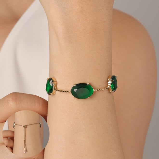 PU-00911 PULSEIRA BANHADA A OURO 18K COM TR&Ecirc;S PEDRAS DE ZIRC&Ocirc;NIA EM FORMATO OVAL E FECHO AJUST&Aacute;VEL