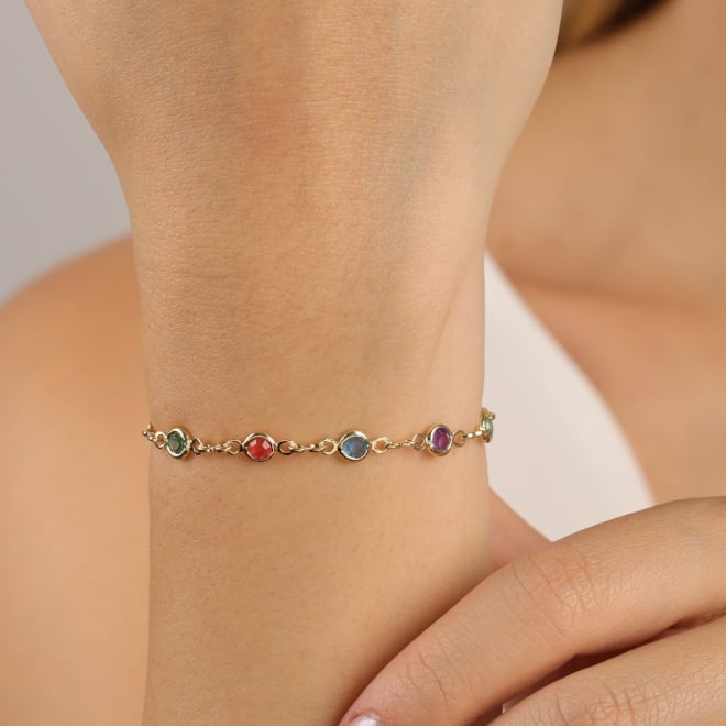 PU-00947 PULSEIRA BANHADA A OURO 18K COM PEDRAS COLORIDAS EM FORMATO REDONDO