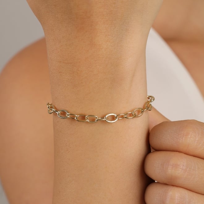 PU-00979 PULSEIRA BANHADA A OURO 18K COM ELOS OVAIS ALONGADOS.