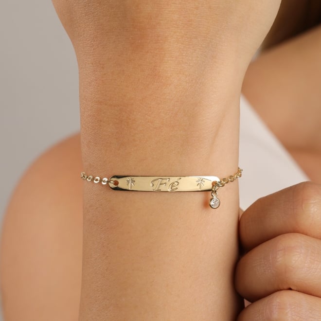 PU-00980 PULSEIRA BANHADA A OURO 18K COM PLAQUINHA F&Eacute; E PONTO DE LUZ.