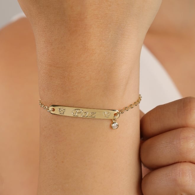 PU-00981 PULSEIRA BANHADA A OURO 18K COM PLAQUINHA PAZ E PONTO DE LUZ.