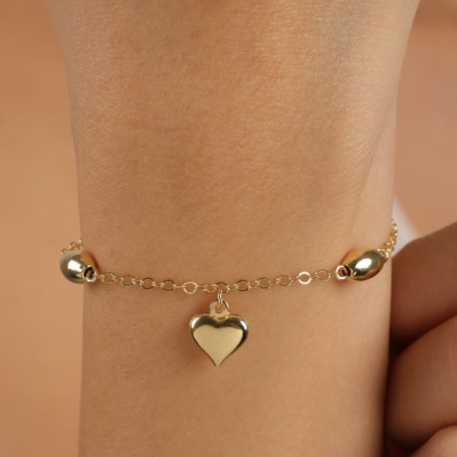 PU-01060-PULSEIRA COM ESFERAS LISAS E PINGENTE DE CORAÇÃO