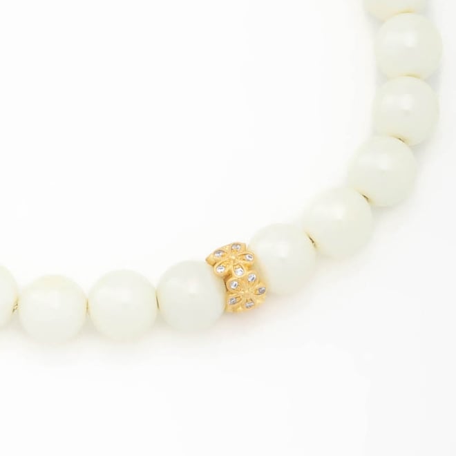 PX-0071 PULSEIRA BANHADA A OURO 18K COM P&Eacute;ROLAS E DETALHE CENTRAL EM ZIRC&Ocirc;NIAS