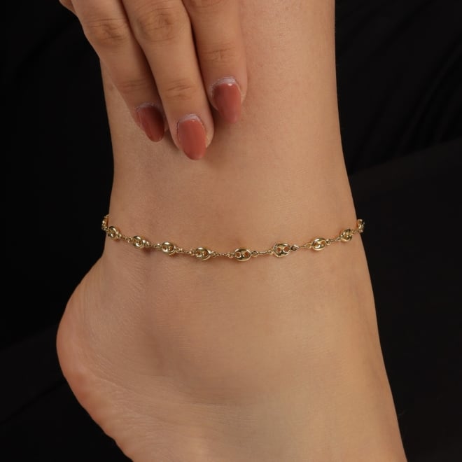 TN-00043 TORNOZELEIRA BANHADA A OURO 18K COM DETALHES EM ESFERAS VAZADA