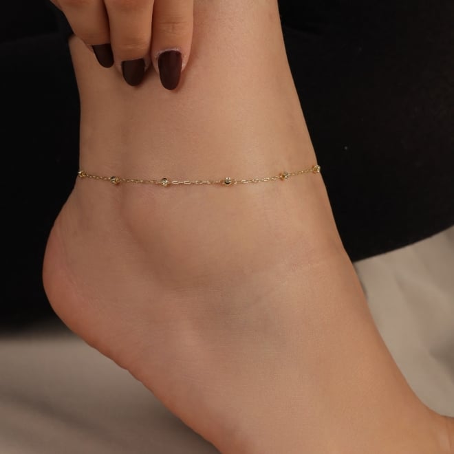 TN-00119 TORNOZELEIRA BANHADA A OURO 18K COM DETALHES EM ESFERAS
