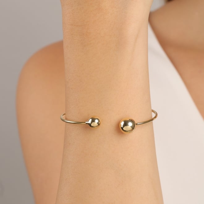 BL-00110 BRACELETE BANHADO A OURO 18K COM DESIGN ABERTO E DETALHES EM ESFERAS