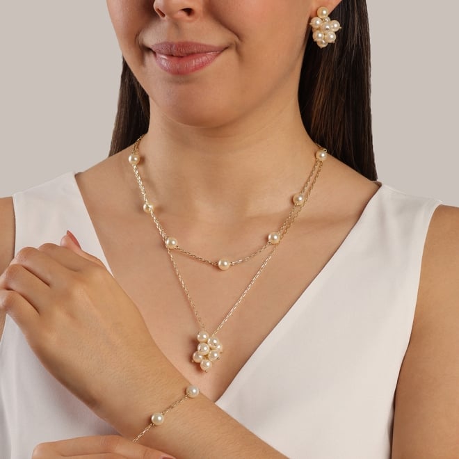 GR-01500 COLAR BANHADO A OURO 18K COM PINGENTE TIPO CACHO EM PÉROLAS