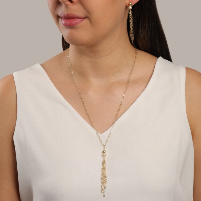 BR-01745-BRINCO LONGO COM PÉROLA DE CORRENTES EM ELO CORAÇÃO