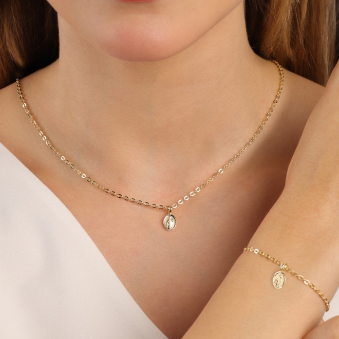 PU-01021-PULSEIRA BANHADA A OURO 18K COM MEDALHA OVAL DE N. S. DAS GRAÇAS