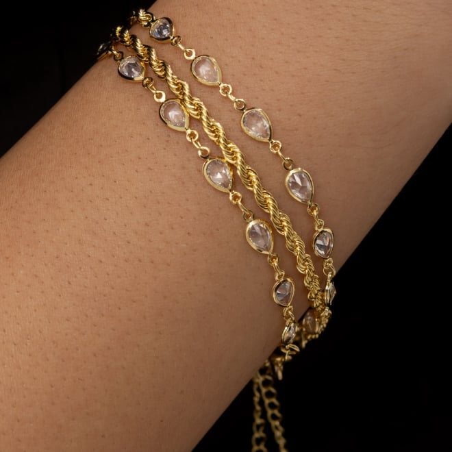 PX-0057 PULSEIRA BANHADA A OURO 18K COM ZIRCÔNIAS EM FORMATO DE GOTA CRAVEJADAS