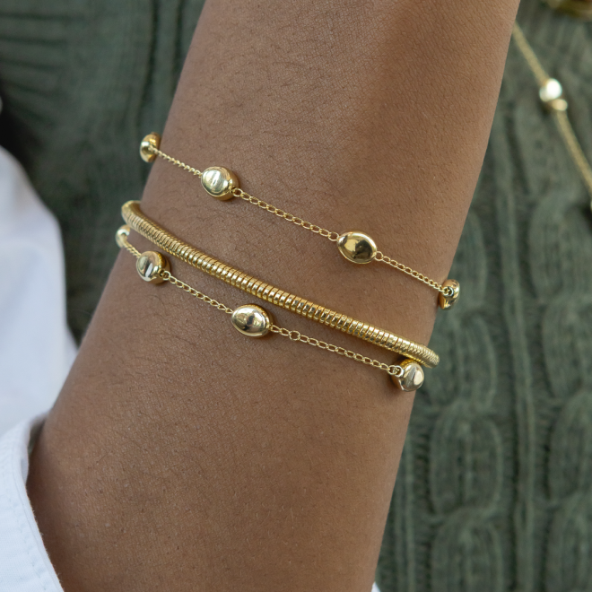 PU-00819 PULSEIRA COM DETALHES EM ESFERAS OVAIS