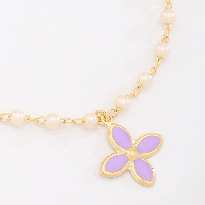 PI-00104 PULSEIRA COM DETALHES EM PÉROLAS E PINGENTE DE FLOR
