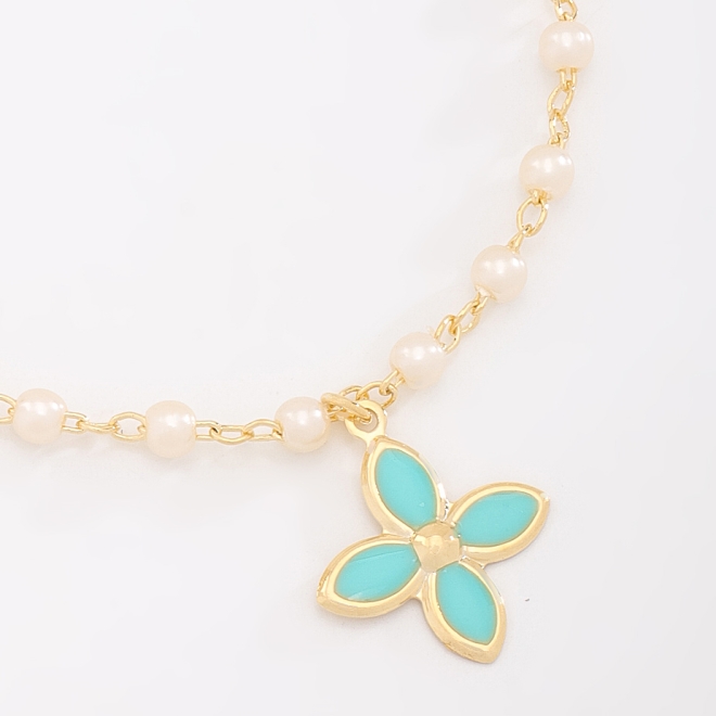 PI-00104 PULSEIRA COM DETALHES EM PÉROLAS E PINGENTE DE FLOR