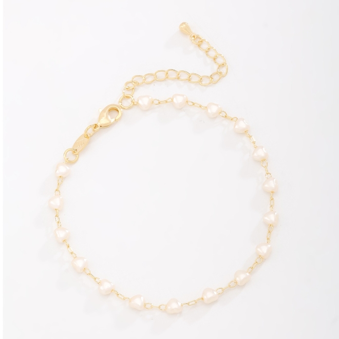PU-00011 PULSEIRA BANHADA A OURO 18K COM PÉROLAS EM FORMATO DE CORAÇÃO