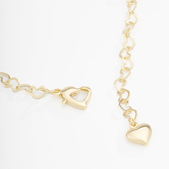 PU-00030 PULSEIRA BANHADA A OURO 18K COM CORRENTE EM ELOS DE CORAÇÃO E FECHO EM CORAÇÃO