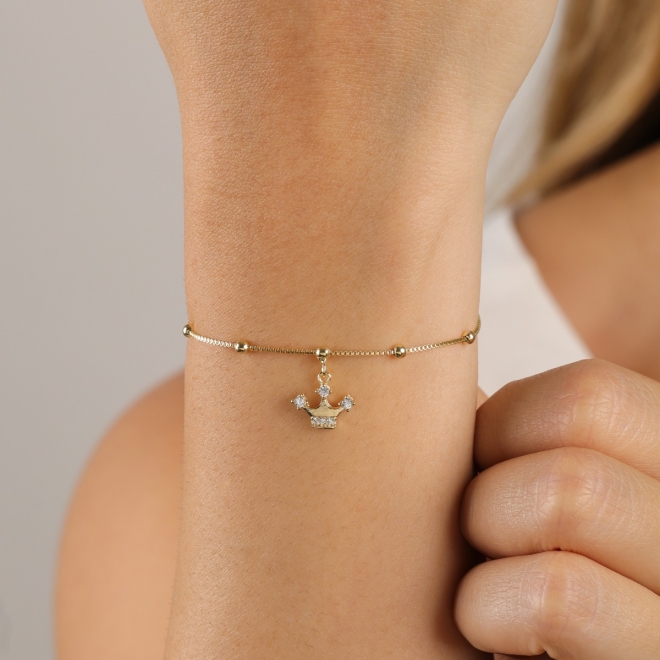 PU-00100-PULSEIRA COM ESFERAS E PINGENTE DE COROA