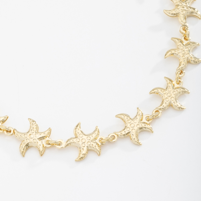 PU-00498 PULSEIRA COM DETALHES DE ESTRELAS DO MAR INTERLIGADAS