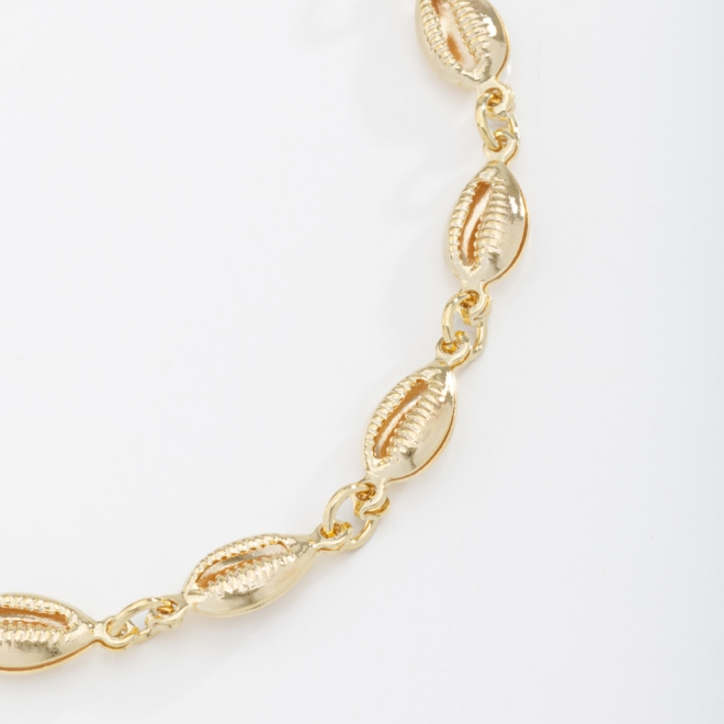 PU-00499 PULSEIRA COM DETALHES DE BÚZIOS INTERLIGADOS