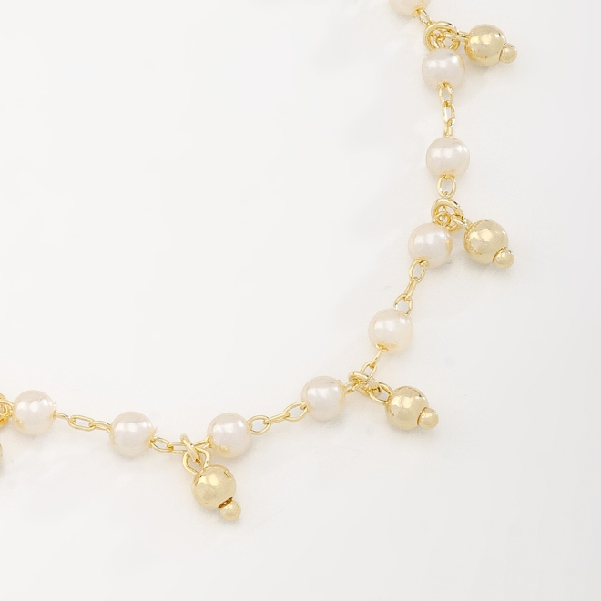 PU-00800 PULSEIRA COM DETALHES EM PÉROLAS E ESFERAS