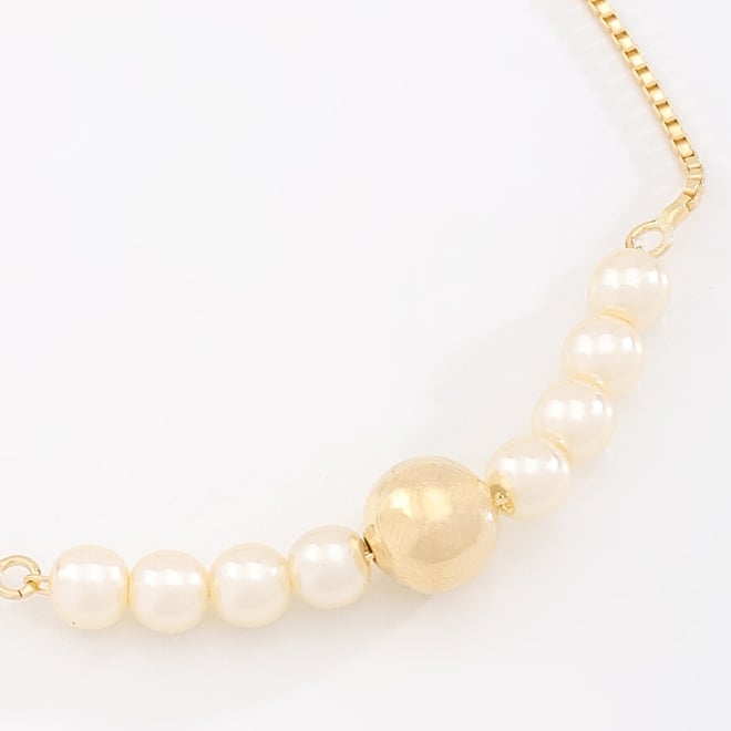 PU-00846 PULSEIRA GRAVATA COM DETALHES EM PÉROLAS E ESFERA CENTRAL POLIDA