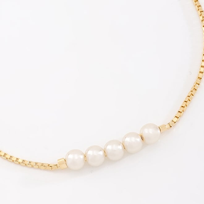 PU-00856 PULSEIRA AJUSTÁVEL COM DETALHES EM PÉROLAS