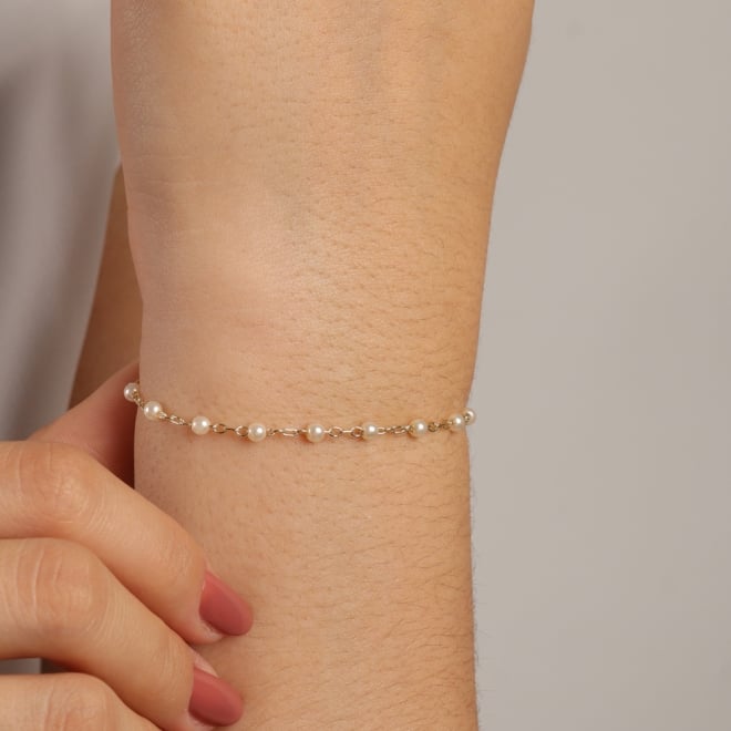 PU-00899 PULSEIRA COM DETALHES EM PÉROLAS
