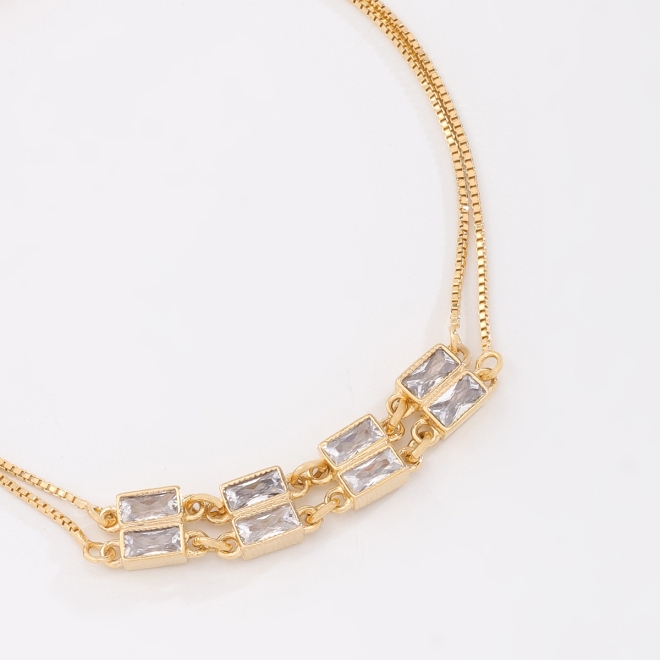 PU-01013 PULSEIRA COM ZIRCÔNIAS EM FORMATO BAGUETE E FECHO REGULÁVEL